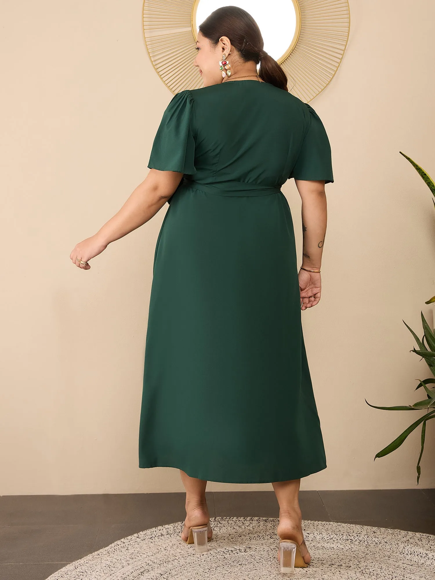 Berrylush Curve Women Solid Green V-Neck Flared Sleeves Tie-Up Waist Asymmetrical Hem Wrap Ruffled Maxi Dress